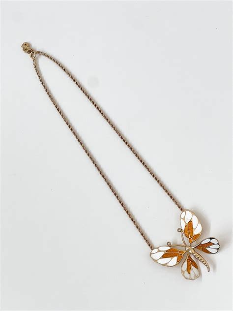 dior butterfly|dior butterfly necklace.